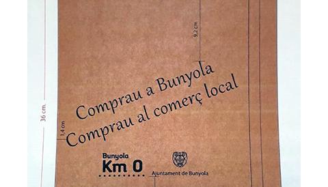 Bosses de paper per al comerç local